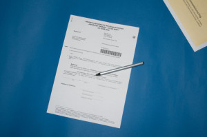 Füllen Sie den Abstimmungsschein aus.